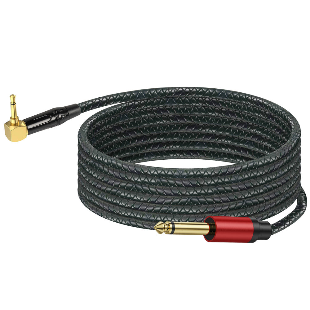 Coiled audio cable with gold and red connectors on a white background