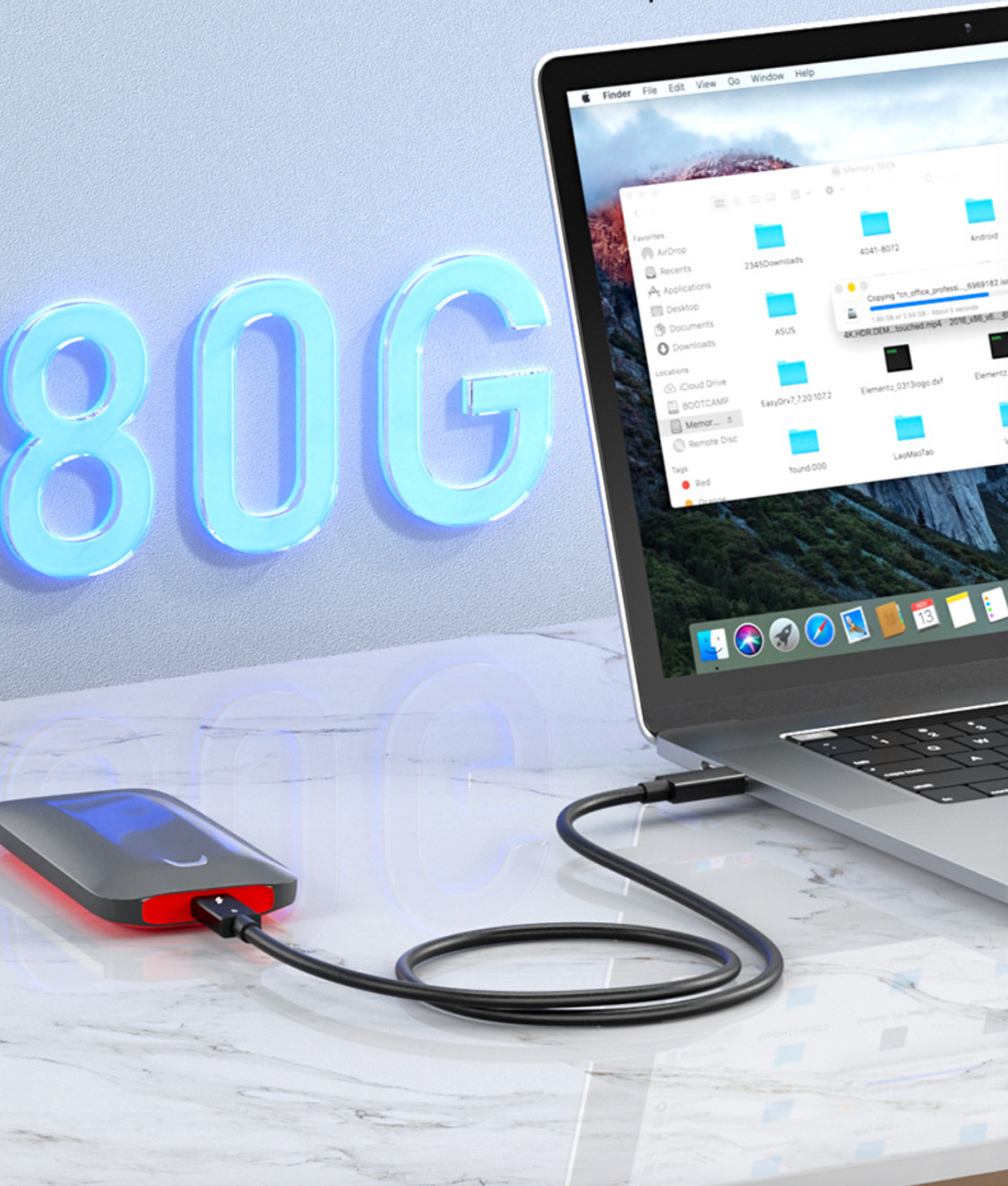 Laptop connected to a portable hard drive with '80G' displayed in the background.