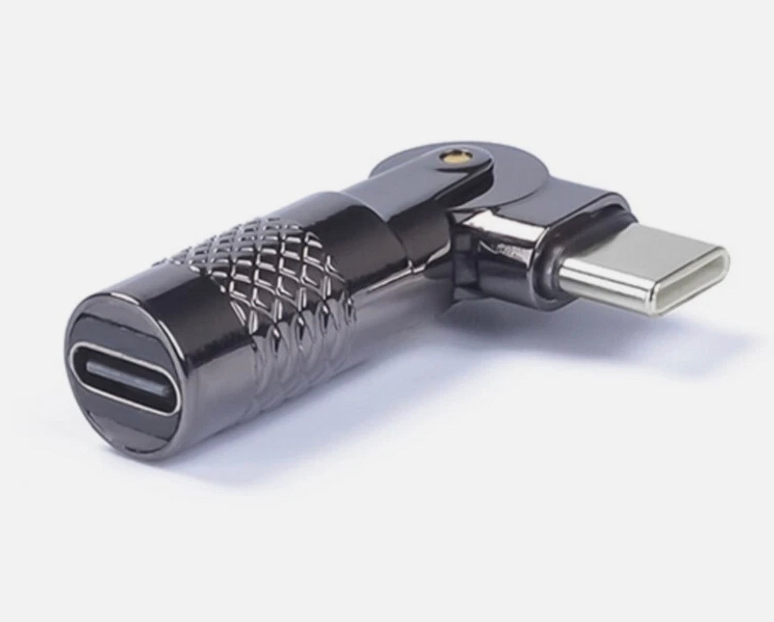 Metallic USB adapter on a white background