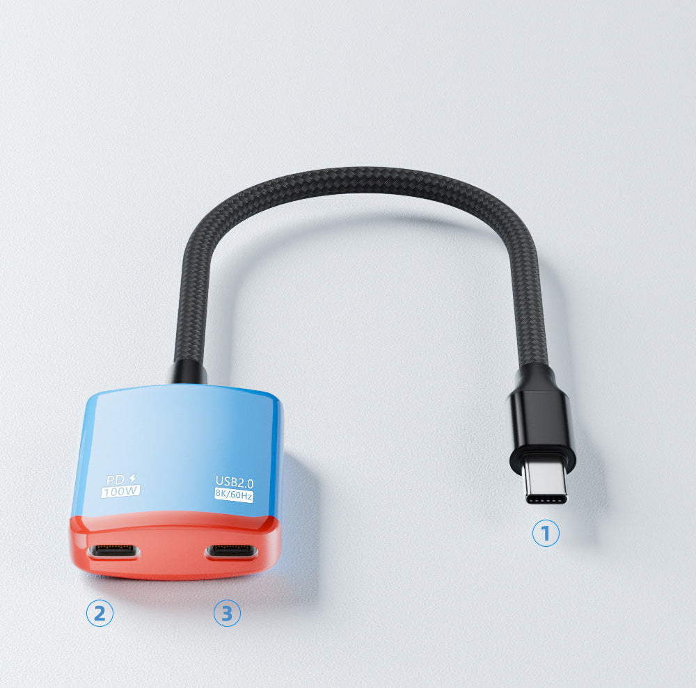 Blue and red USB-C adapter on a light gray background 