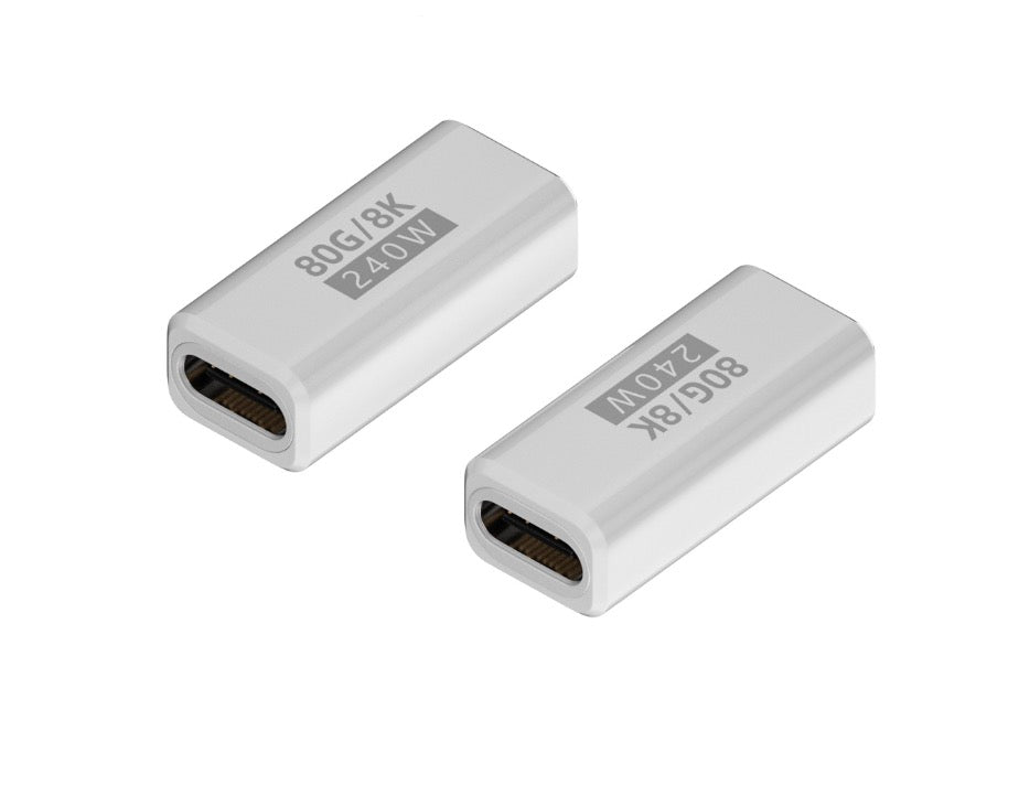 Two USB C extension adapters, one with Type C female to female text, in black color.
