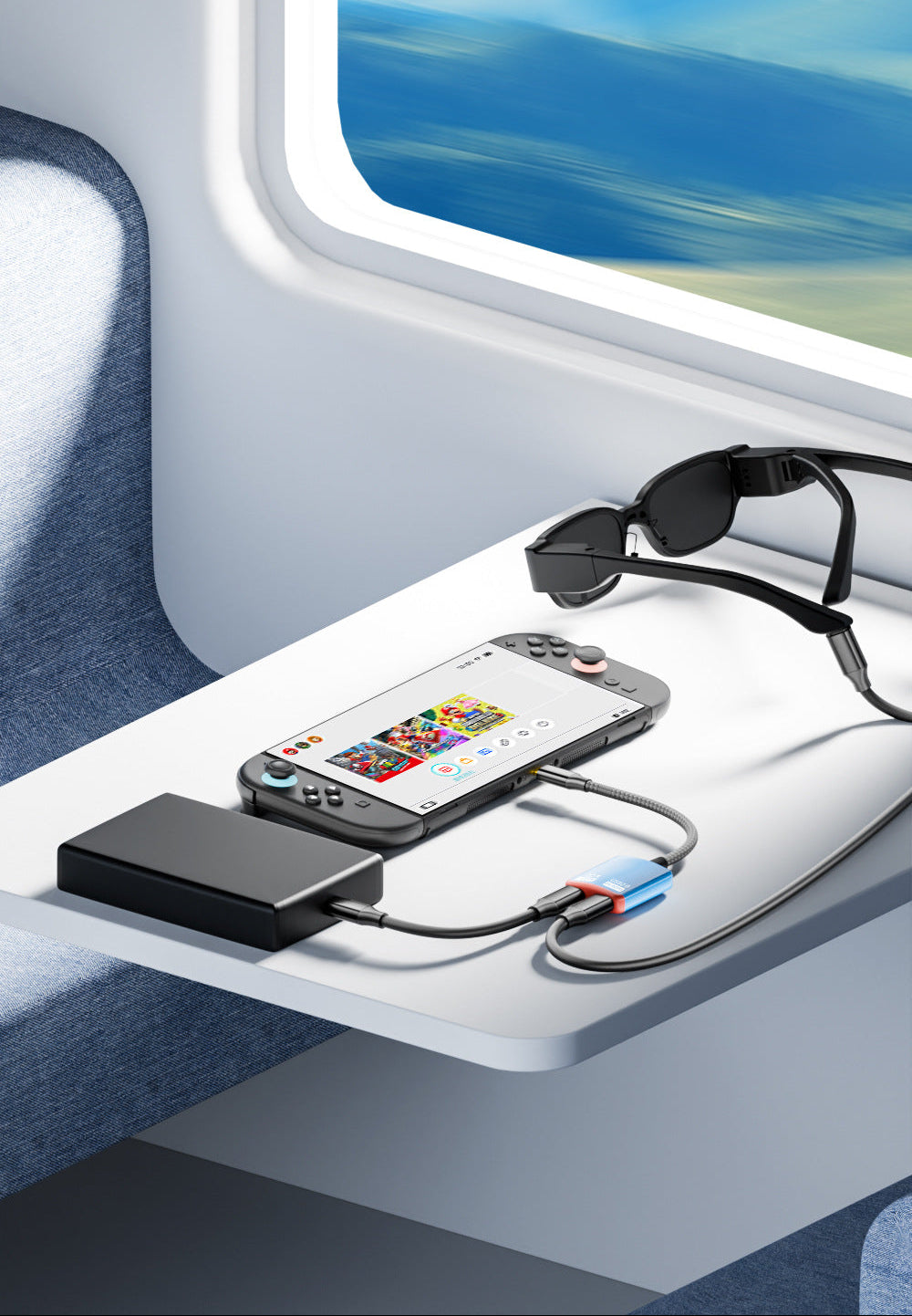 Phone with charging cable on a tray table with sunglasses and power bank, window view in background