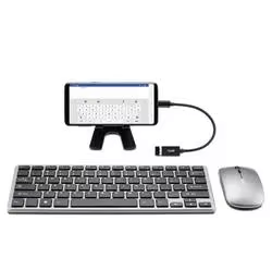 Keyboard, mouse, and external monitor setup on a white background