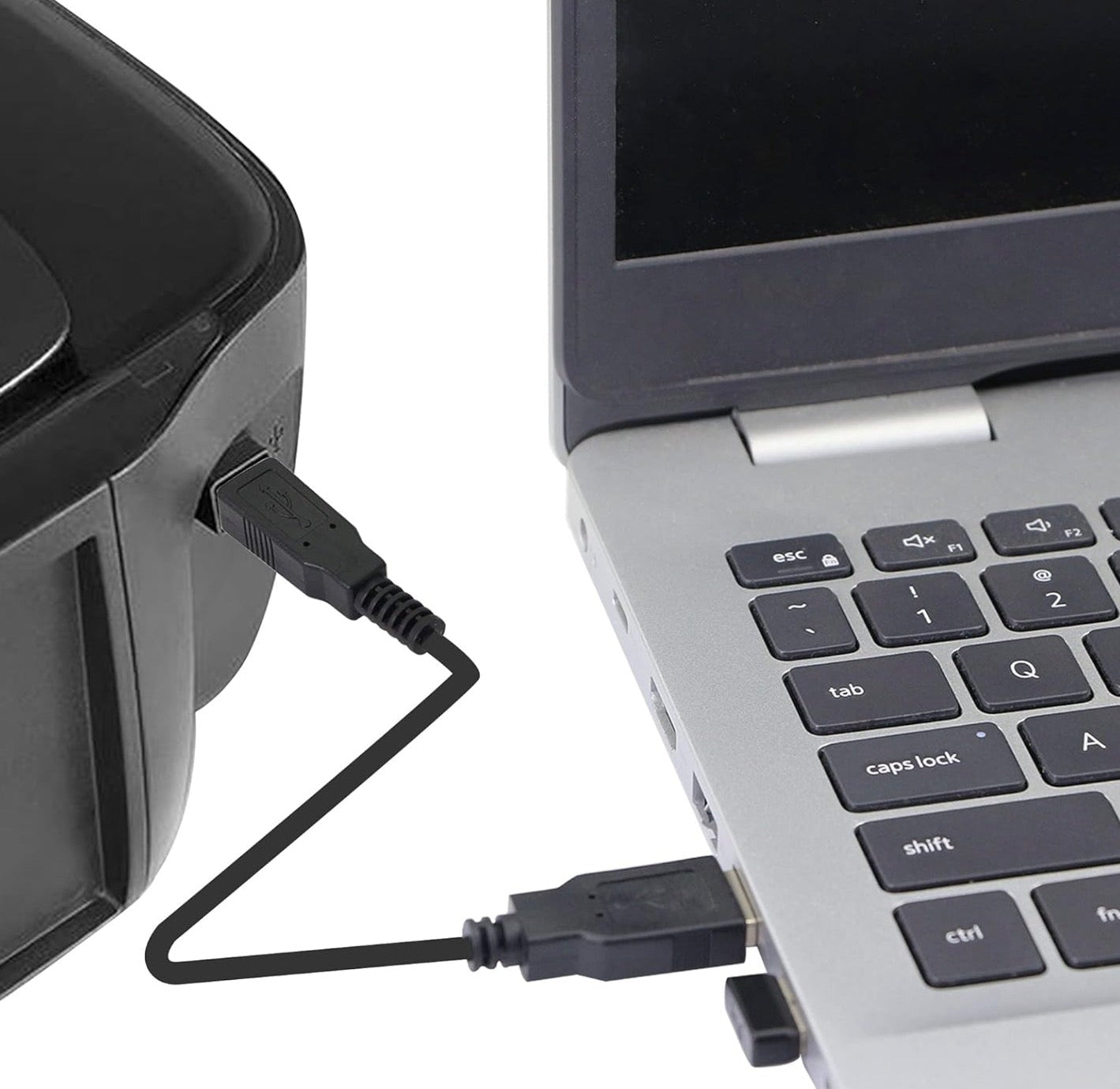 Laptop connected to a printer via USB cable on a white background