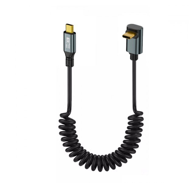 A black USB C to USB C coiled cable with up and down angled connectors.