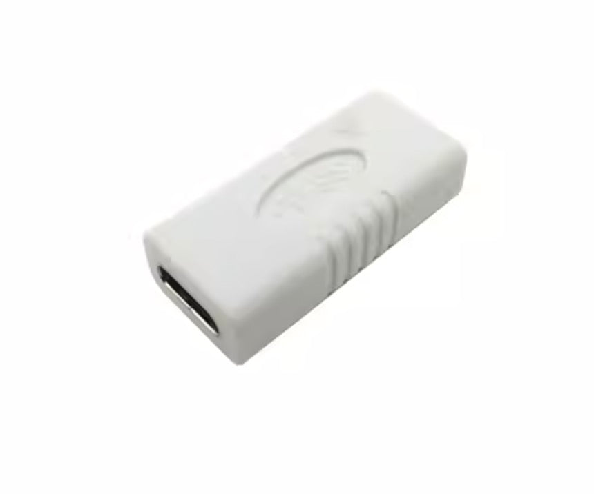A white USB C 3.1 Female to Female extension adapter with a data transfer rate symbol engraved on it.