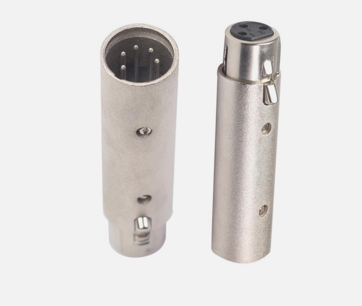 Two metallic cylindrical connectors on a white background