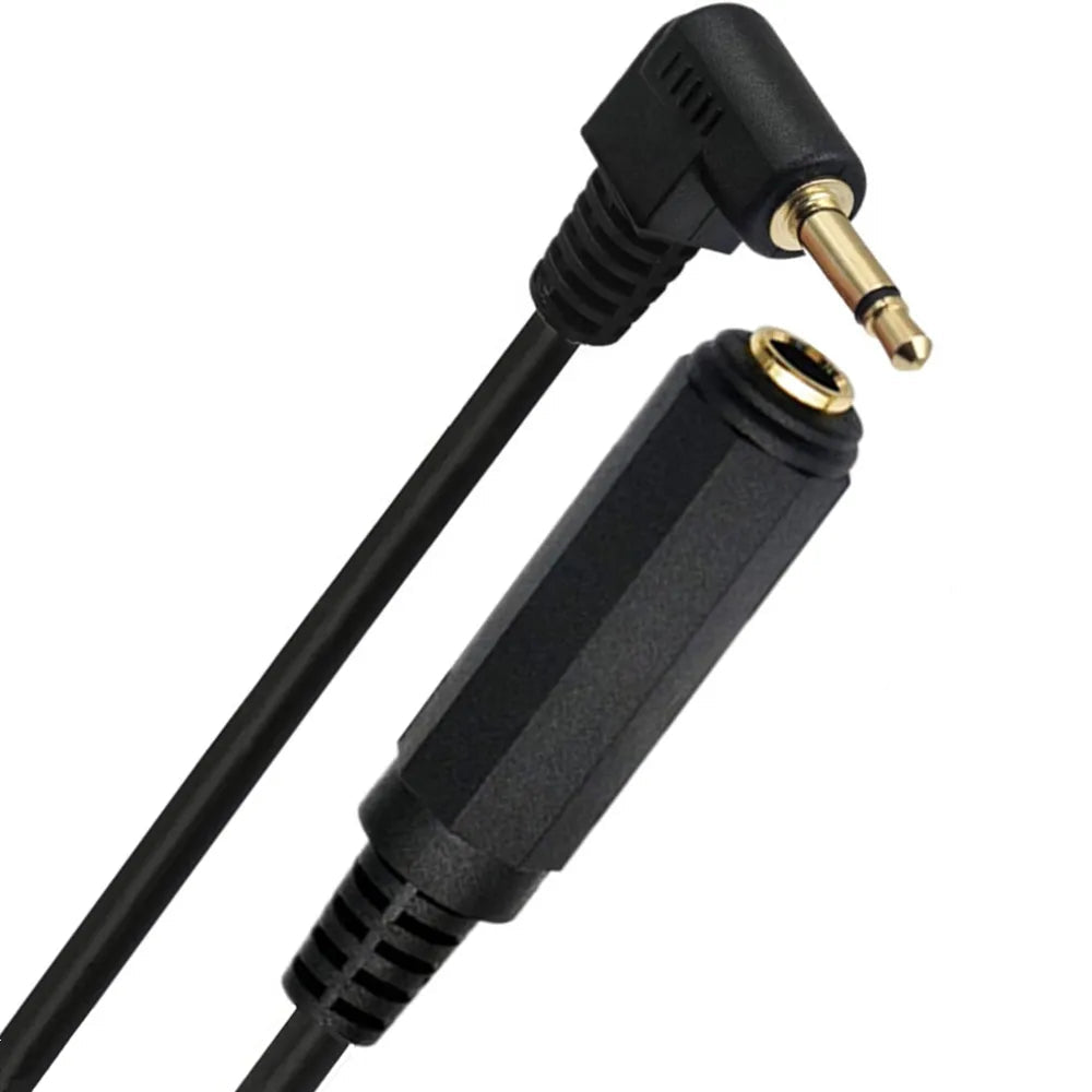 3.5mm to 6.35mm audio cable connected to guitar amplifier setup