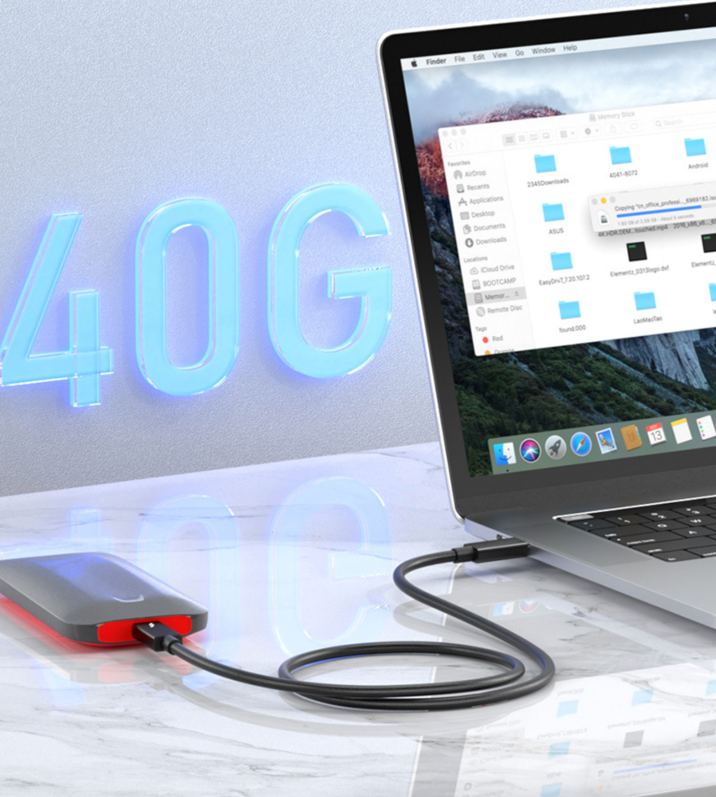 External hard drive connected to a laptop with a digital display showing '40G'.