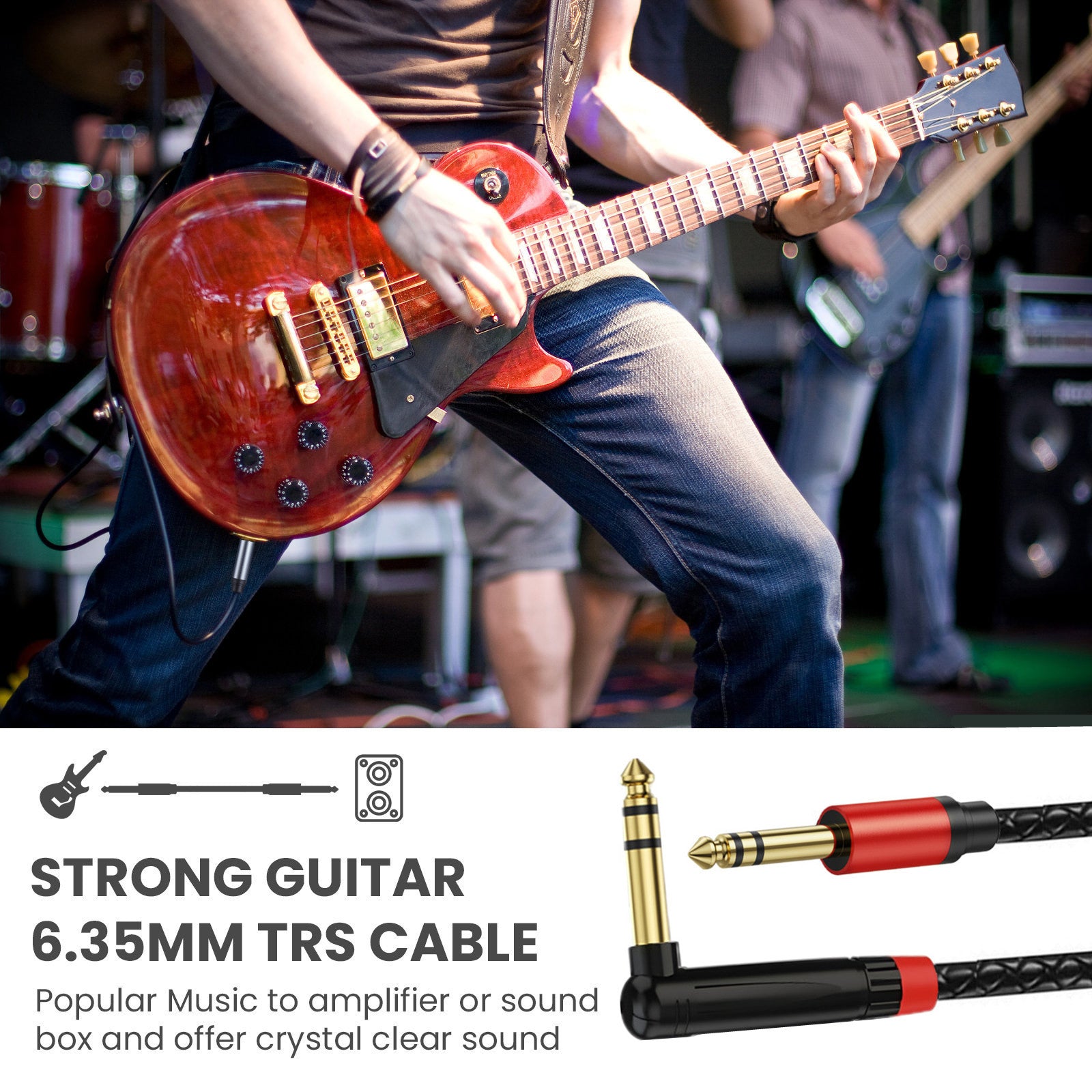 Person playing a red electric guitar with a focus on a guitar cable below.