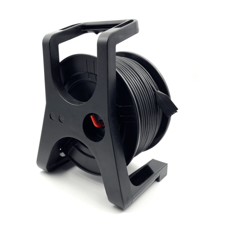Black reel with spool of black cable on a white background