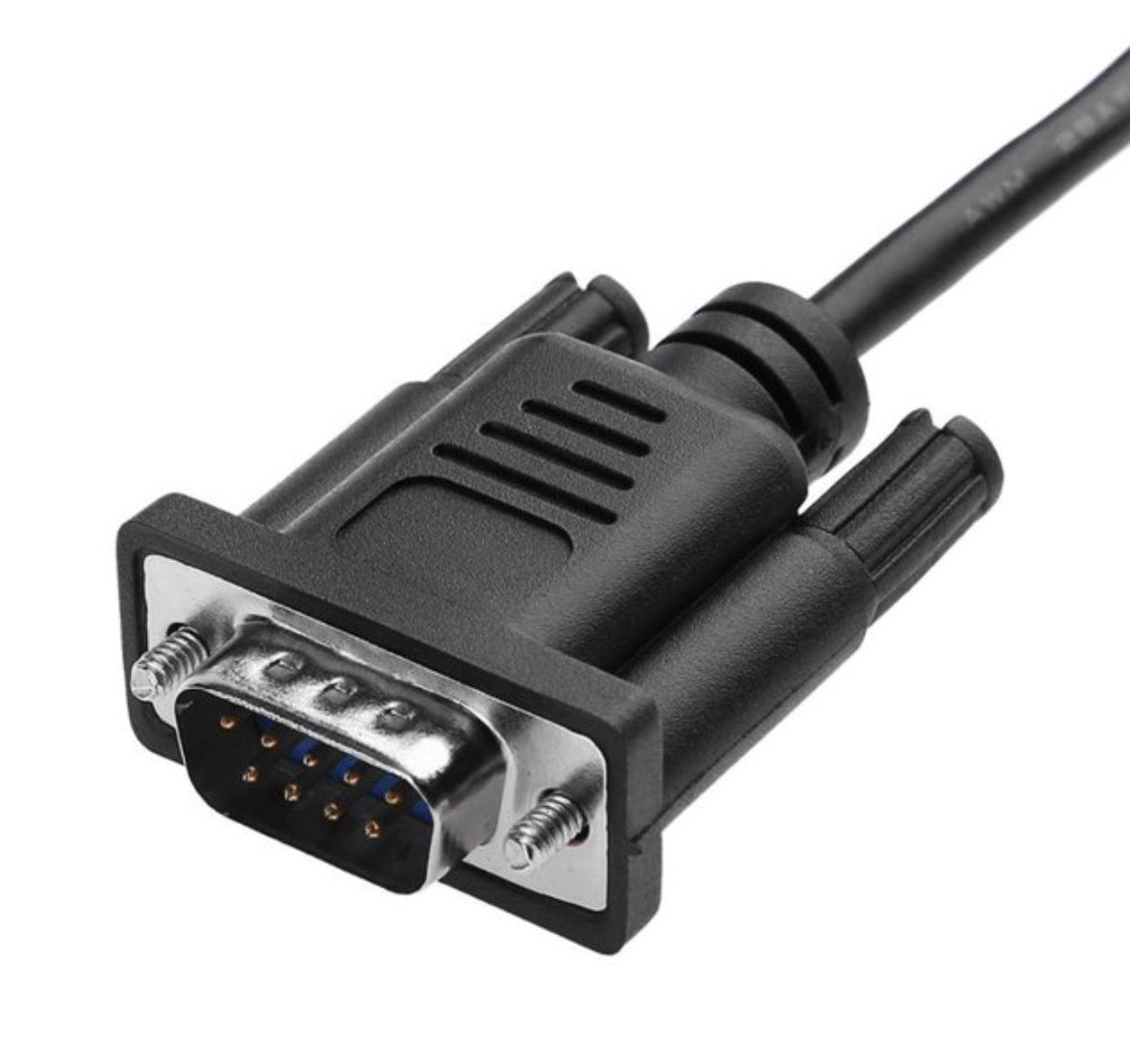 Close-up of DB9 9 pin serial male connector and RJ45 female adapter connection