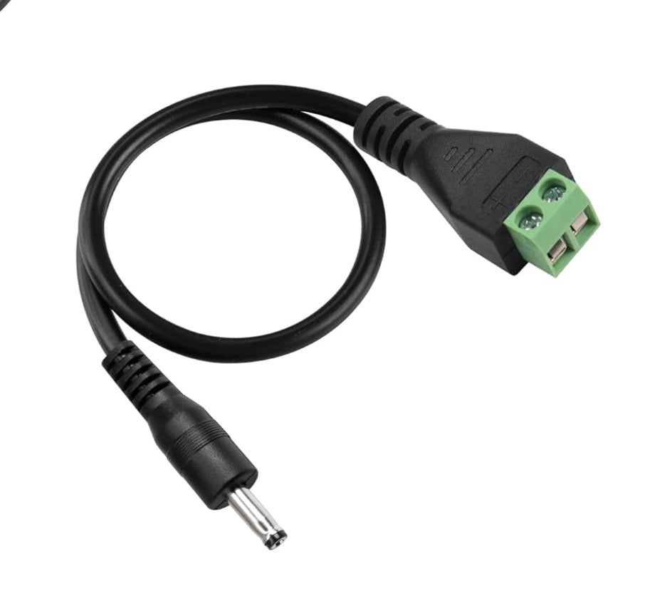 Detailed view of 3.5mm x 1.35mm male DC power jack connector and terminal block assembly