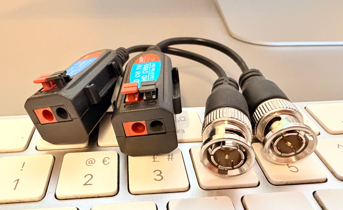 BNC to twisted-pair UTP CCTV video balun with two-wire terminals