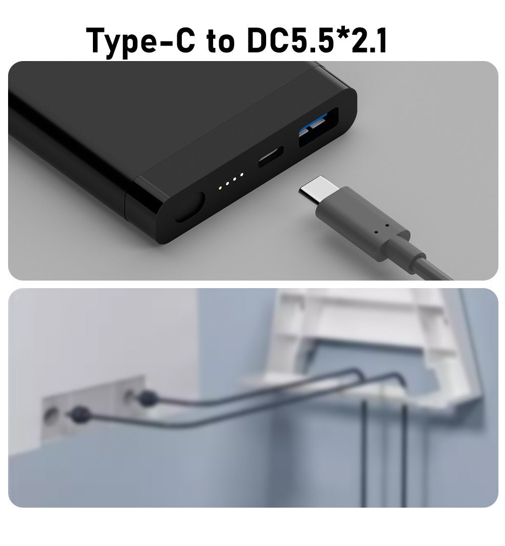 Black Type-C to DC5.5*2.1 adapter with cable on a gray background