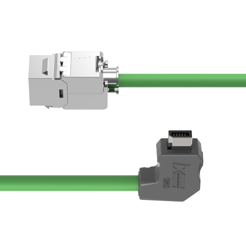 Two connectors with green cables on a white background