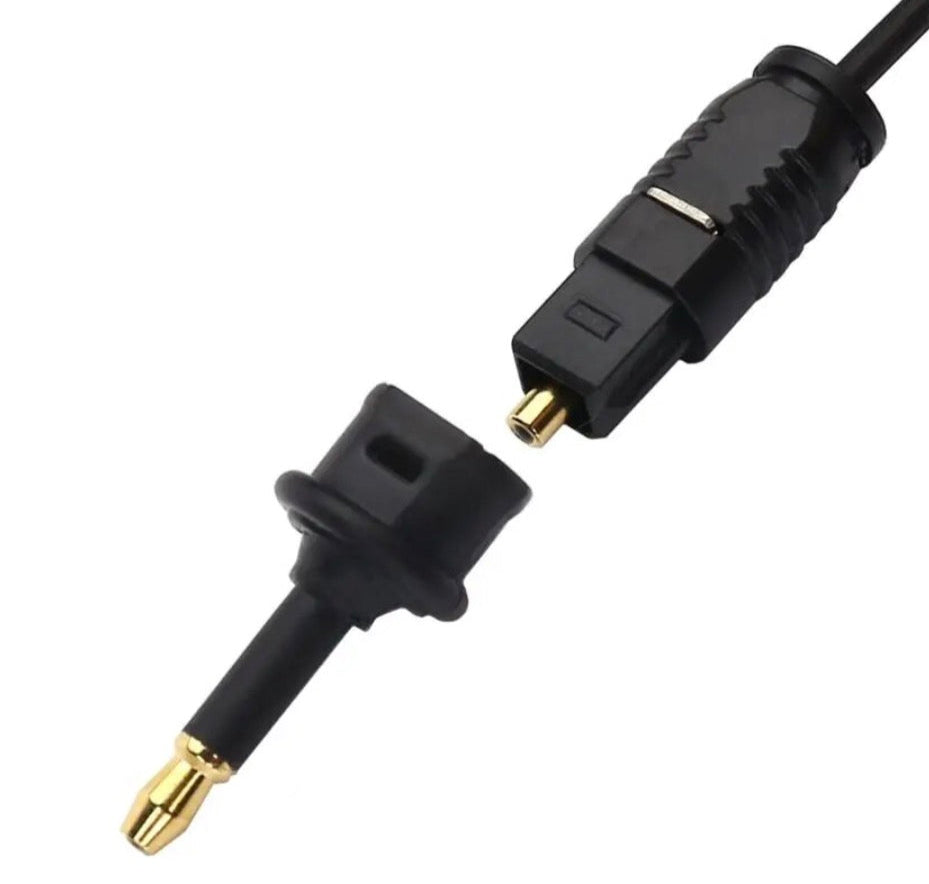 Mini TOSLINK male to TOSLINK female adapter connected to optical audio cable