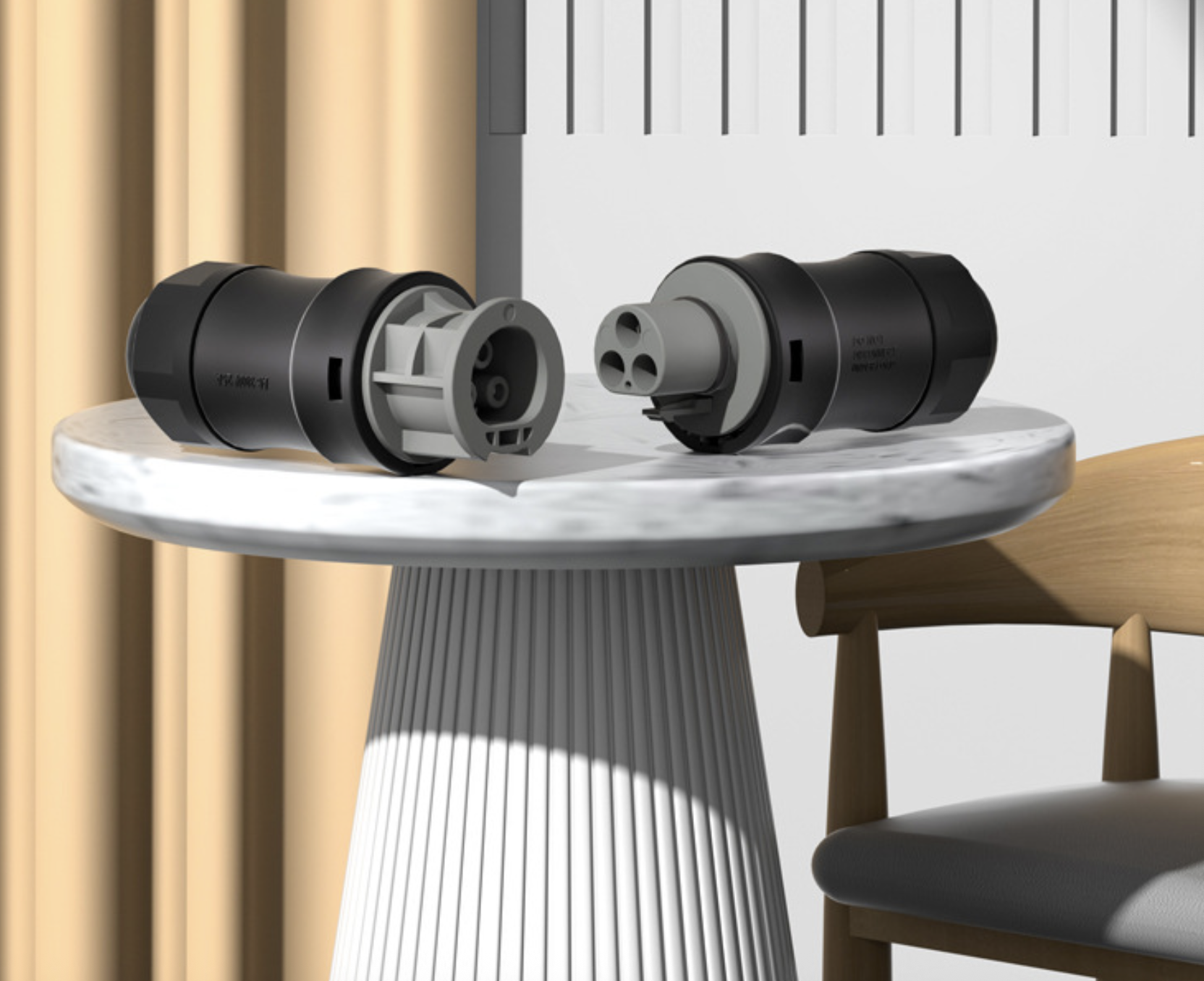 Two black and gray cylindrical objects on a marble table with a chair and curtain in the background.