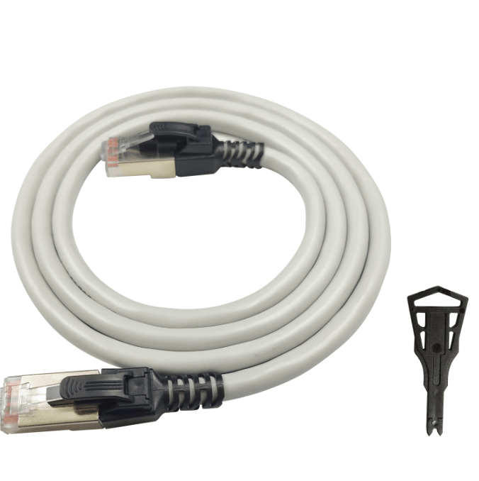 Coiled Ethernet cable with connectors on a white background