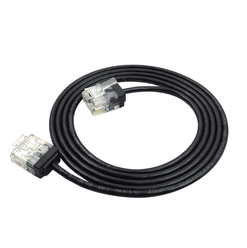 Coiled black Ethernet cable with clear connectors on a white background