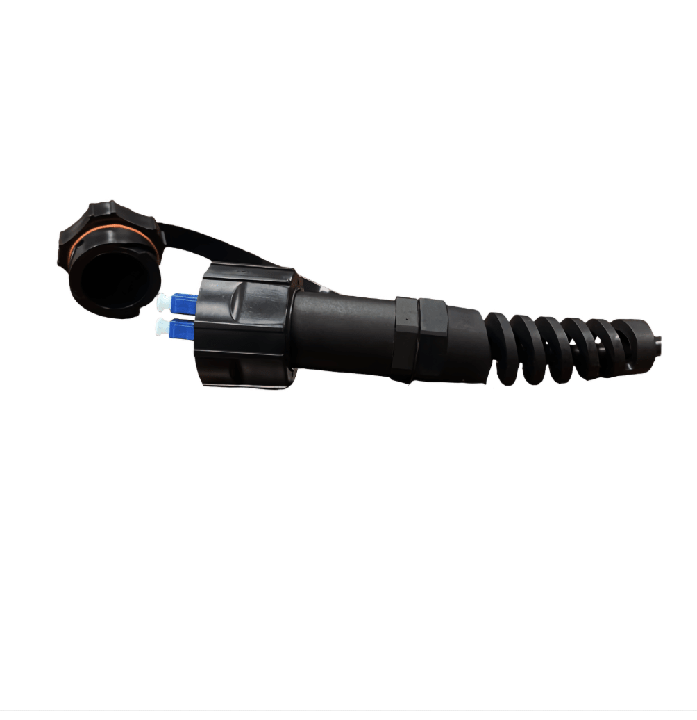 Black mechanical component on a white background