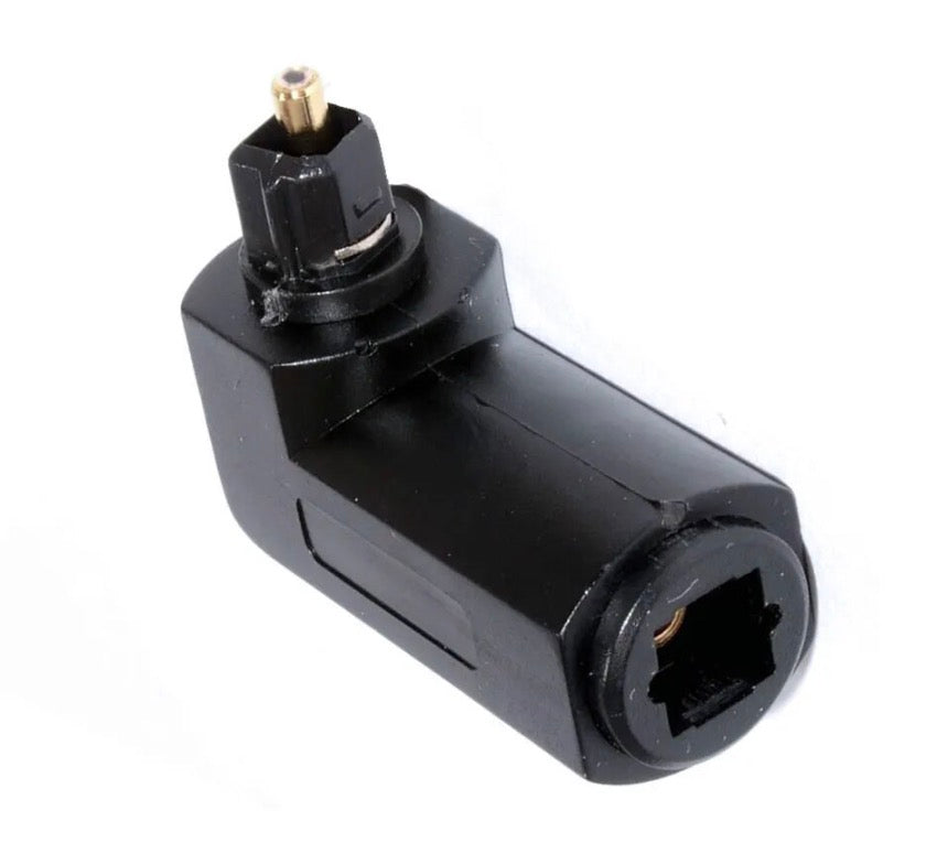 Angled view of TOSLINK optical audio adapter for digital audio systems