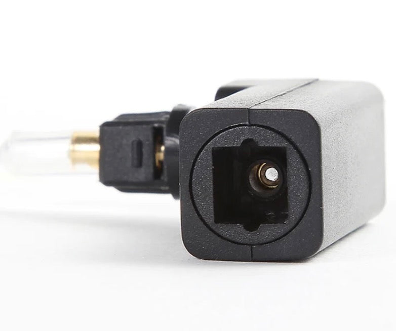 Front connector view of TOSLINK male to female optical adapter