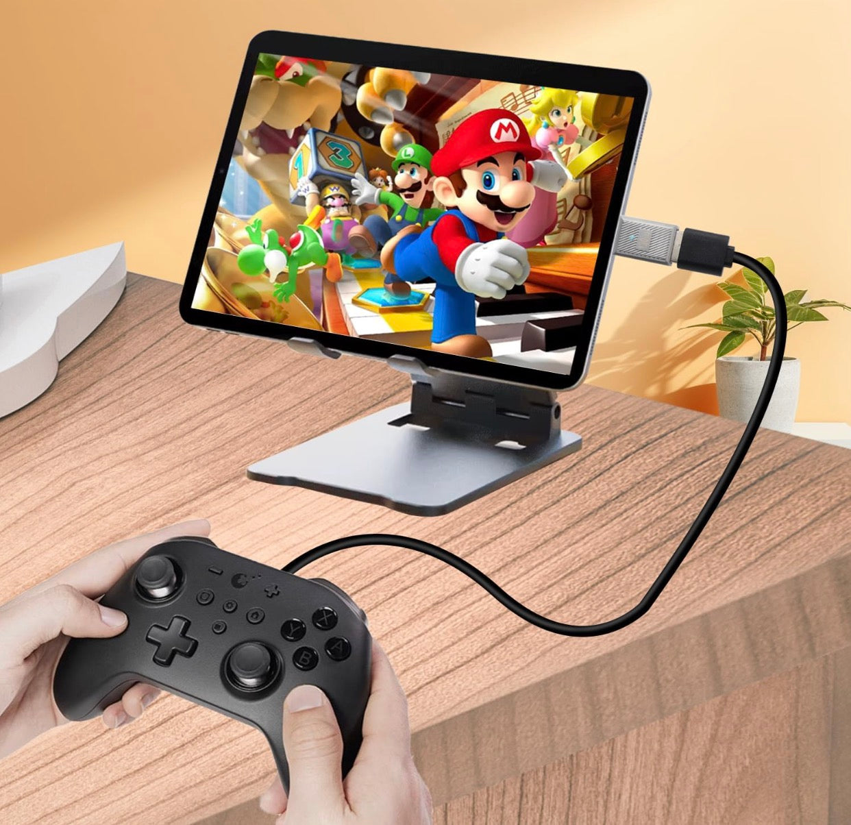 USB C OTG adapter connecting gaming controller to mobile device