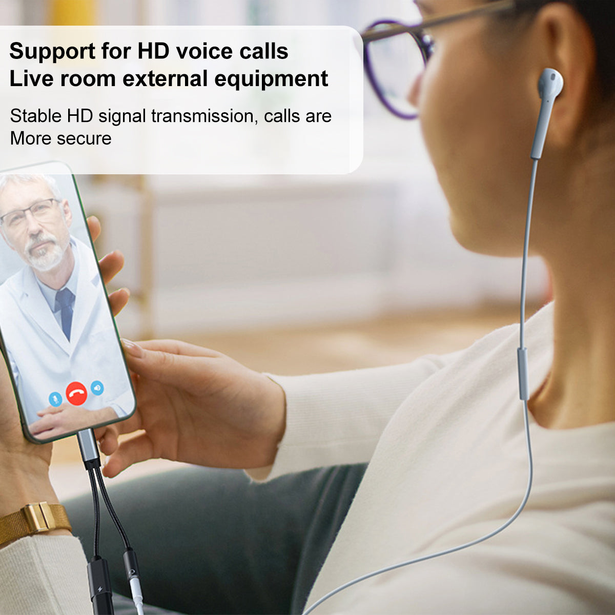 USB-C audio and charging adapter connected to a smartphone with wired headphones