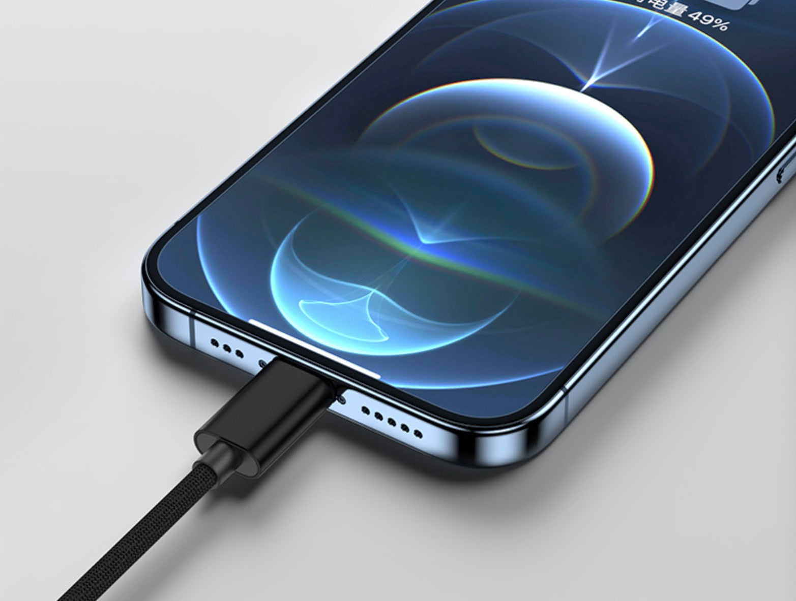 USB-C cable connected to device for charging and data transfer