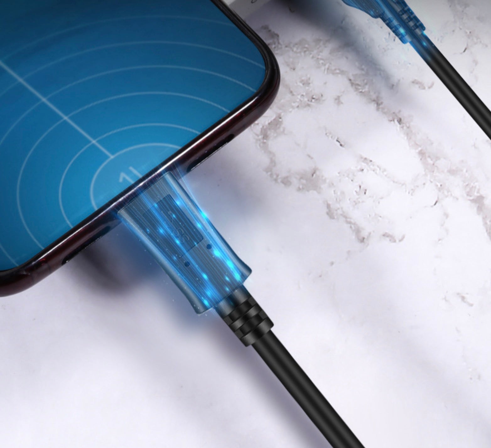 USB-C charging and data cable connected to a smartphone supporting 5Gbps transfer speeds