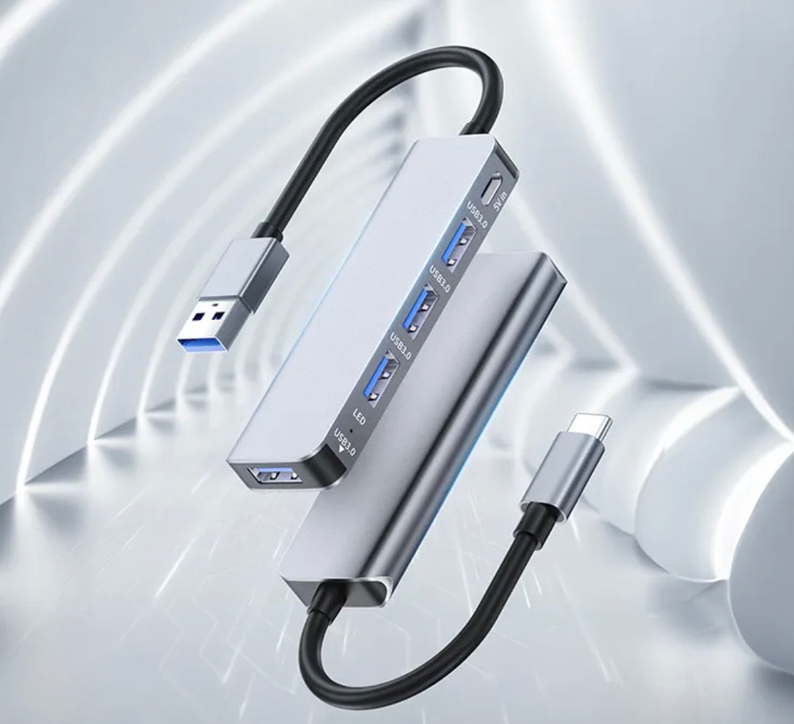 USB-C hub connected to a keyboard, mouse and USB storage device