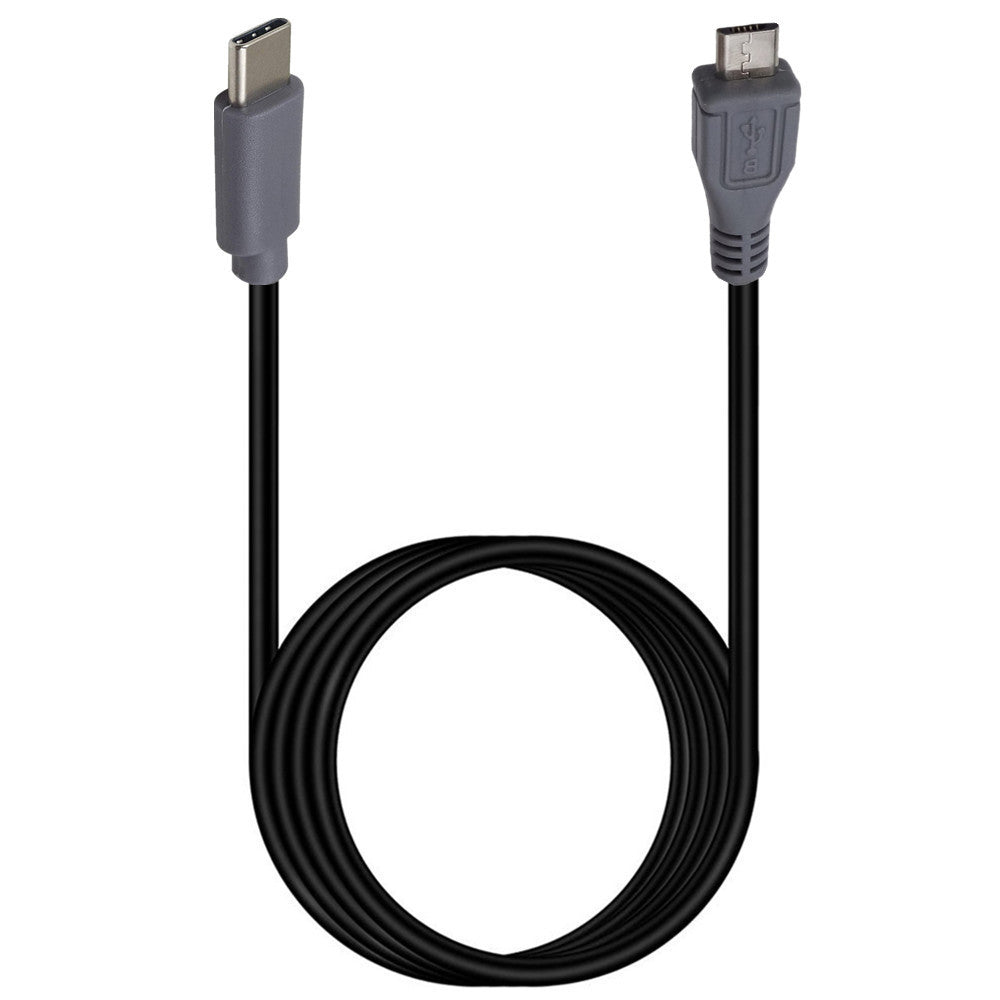 USB C OTG cable connected to smartphone and portable device