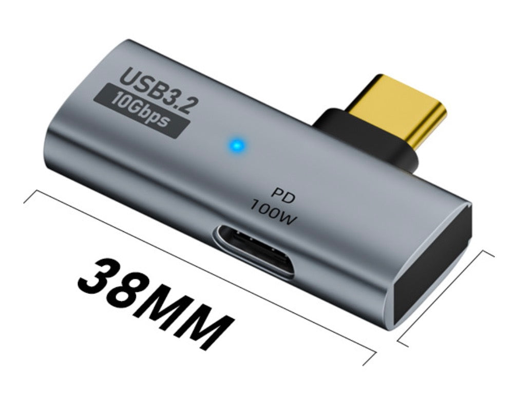 Close-up view of USB-C male and female to USB 3.0 female OTG adapter showing USB-A port and Power Delivery charging port