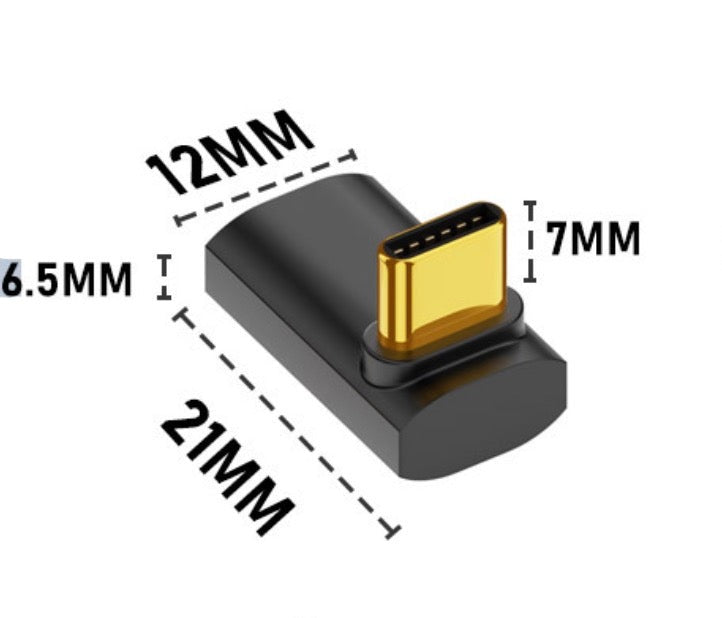 USB4 angled adapter connected to laptop docking and peripheral setup