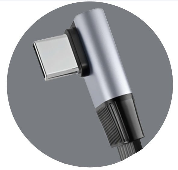 Metallic shower head on a gray background