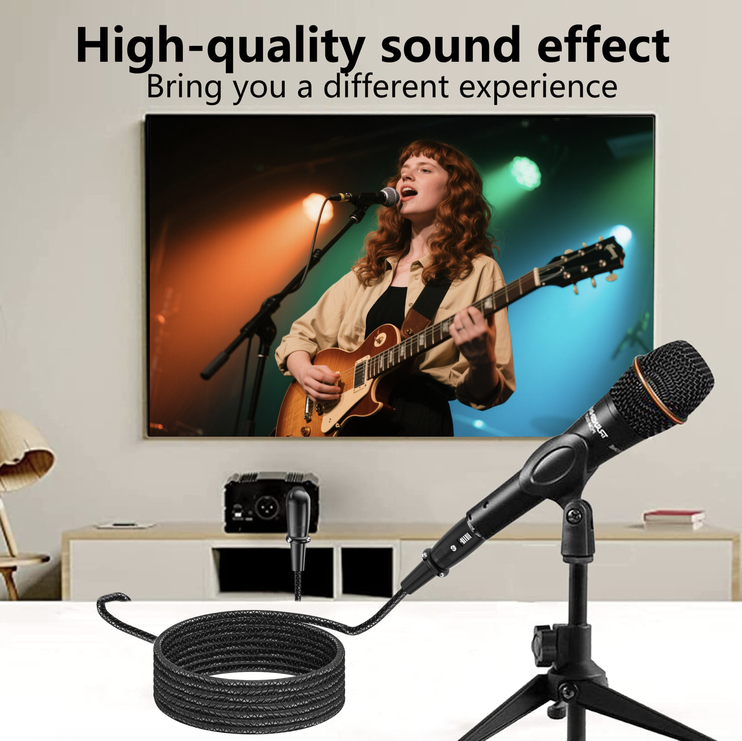Microphone with cable on a stand in front of a TV screen displaying a person playing guitar.
