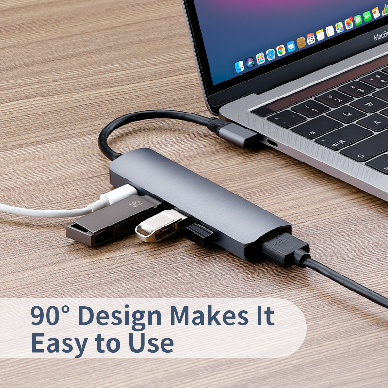 USB-C hub connected to a laptop for HDMI display and USB peripheral expansion