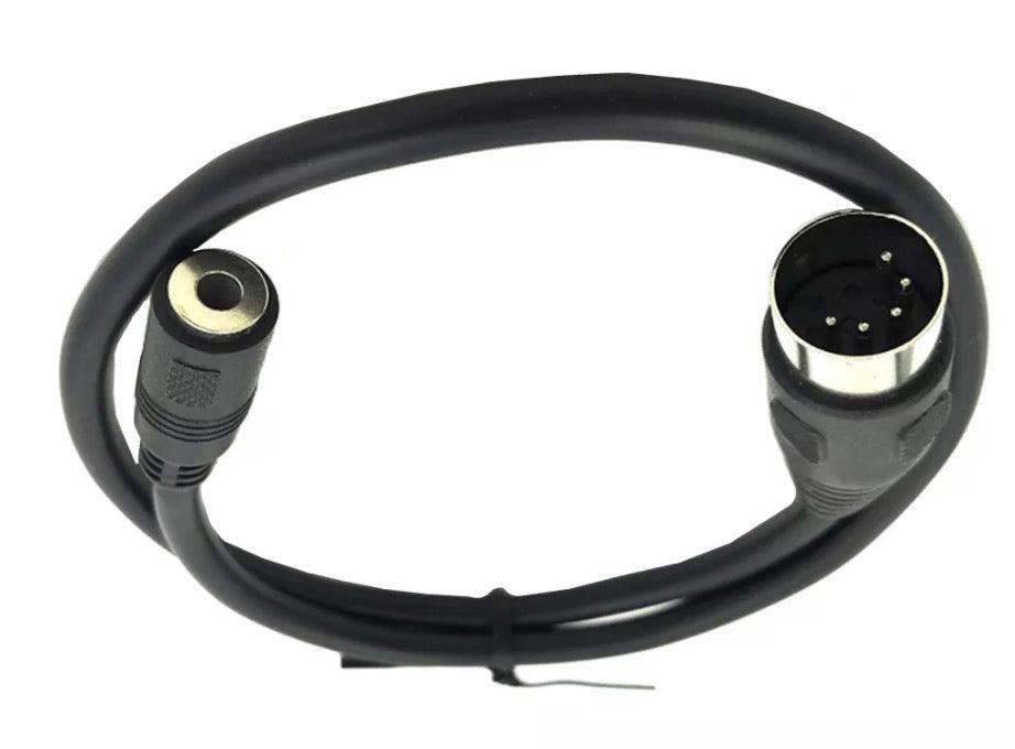 DIN to AUX input cable connected to vintage Hi-Fi system