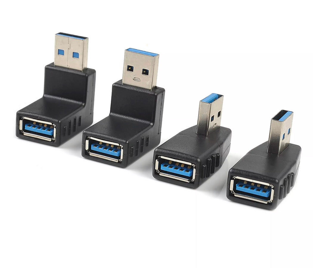 A set of black USB 3.0 Type A angled male to female data adapters in various orientations.