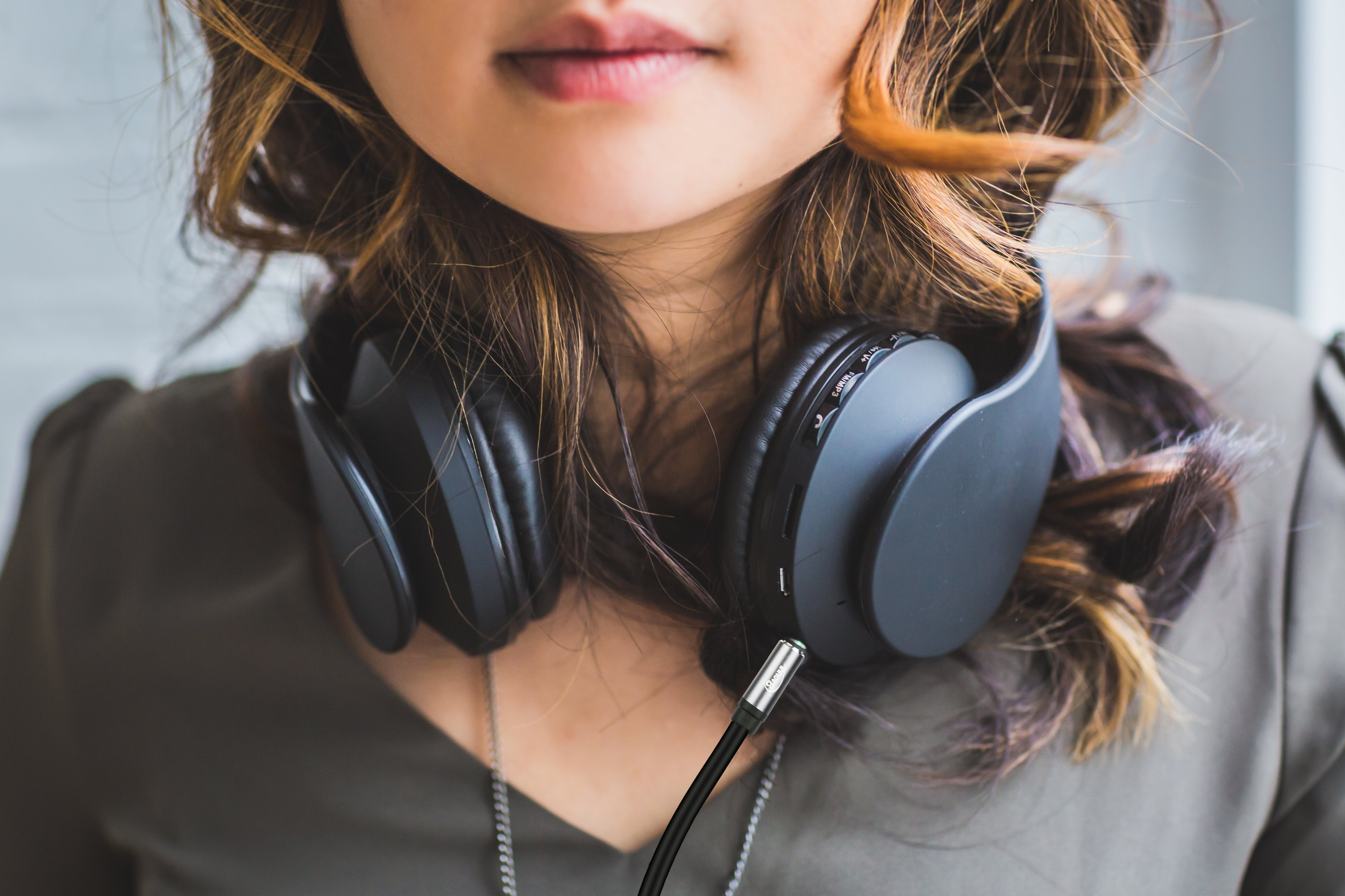 Compact coiled USB-C audio cable with DAC