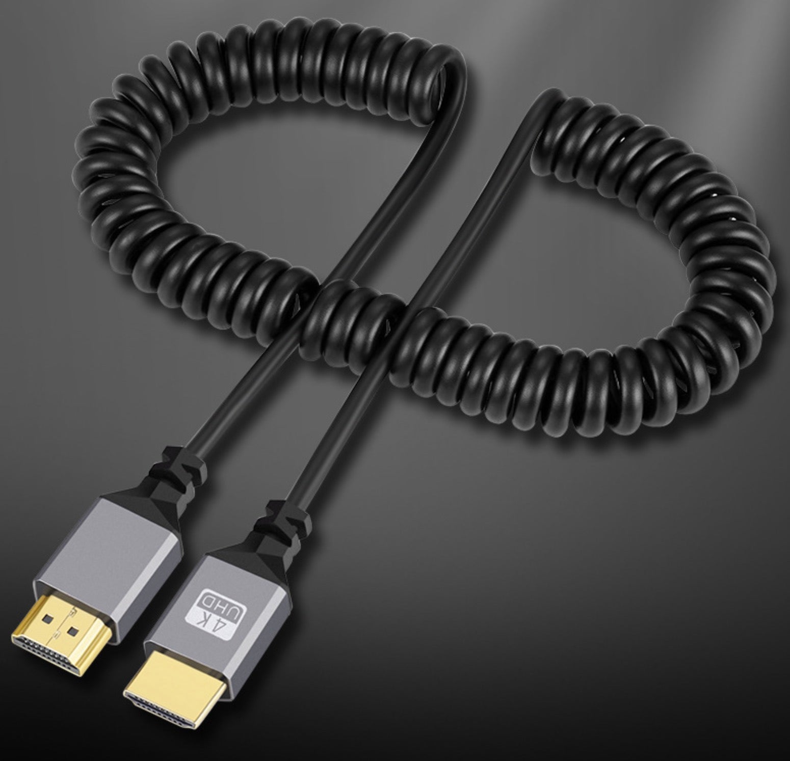 Coiled HDMI 2.0 cable extending for flexible desktop and entertainment setups